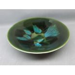 1966 Poole Pottery shallow bowl with a stylised green glazed centre, 11ins diam