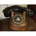 Copper and brass framed telephone with black Bakelite receiver, model no RTT-56A