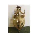 20th century cast brass chandelier with etched shade, three light bulbs supported by a cherub, 20ins