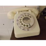 Ivory Bakelite telephone, model no 706L CWL63/1, together with separate ear-piece