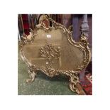 20th century cast brass French style spark guard with rococo style detailing, grille front,