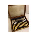 Oak cased set of fish knives and forks