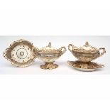 Pair of mid-19th century dessert tureens with covers and matching bases, probably Coalport, modelled