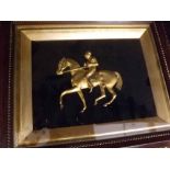 Unusual framed gilt metal study of a mounted jockey, 6 x 8ins
