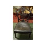 Mahogany framed dining chair with open work shield back, urn and garland decoration, rexine