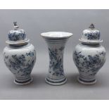 18th century Dutch blue and white Delft garniture with two bulbous lidded vases and a further