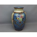 Royal Doulton stoneware large baluster vase, tube lined with panels of flowers etc, 14ins high