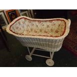 Vintage basket work crib, white four-wheeled trolley base (trolley inscribed "John A Wroth dated