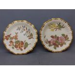 Two Royal Worcester blush plates decorated with Spring flowers, 8 1/2 ins diam