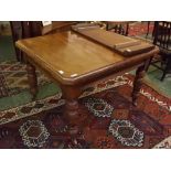 19th century walnut extending dining table with canted corners, on four ring turned legs, on