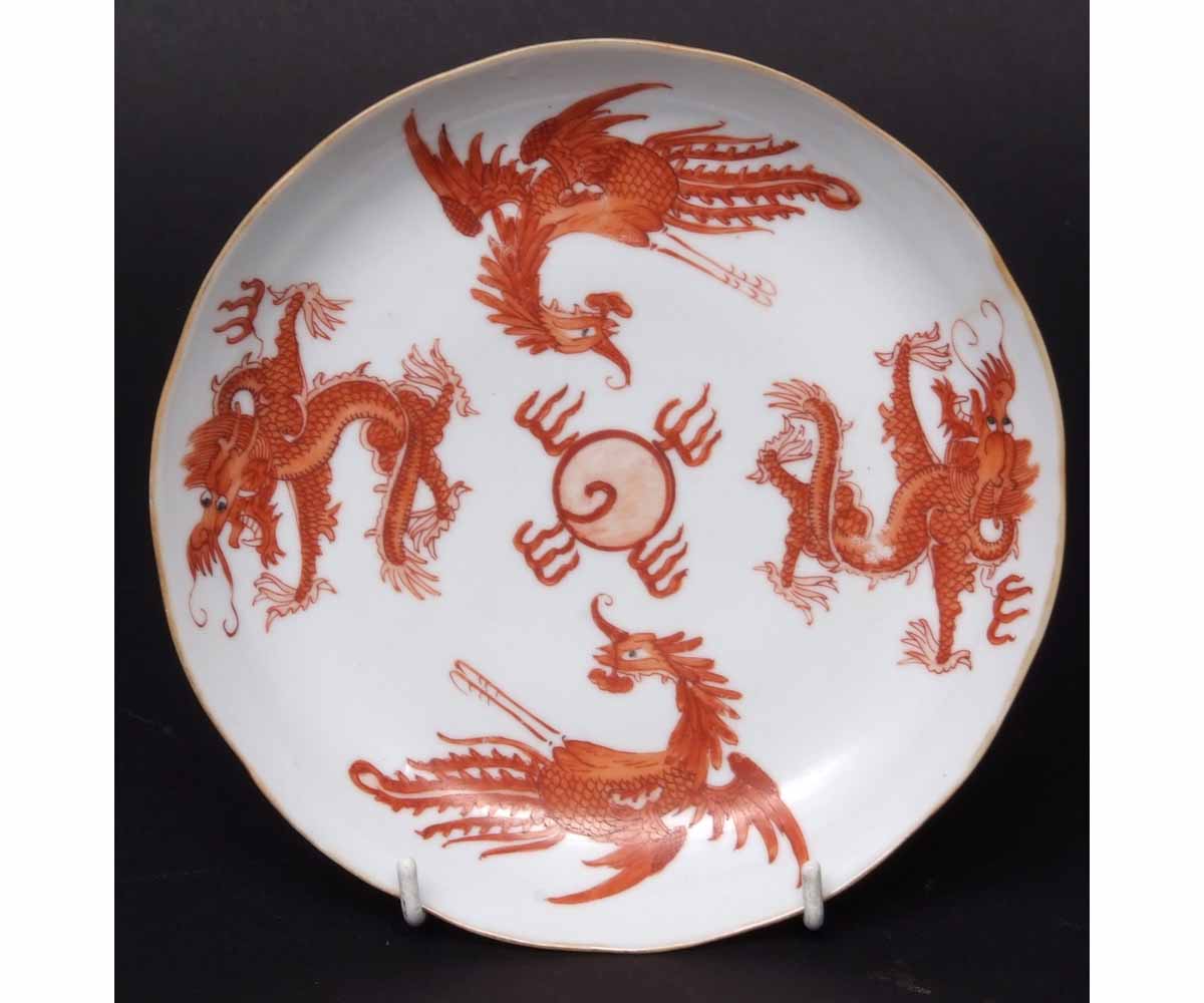 Chinese porcelain dish decorated in overglaze iron red with 2 confronting phoenix and 2 dragons