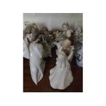 Collection of six various Lladro figures of winged angels and a further non-matching musical group