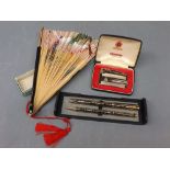 Mixed Lot: Ronson gold plated lighter, two modern brass fountain pens and a modern bamboo fan with