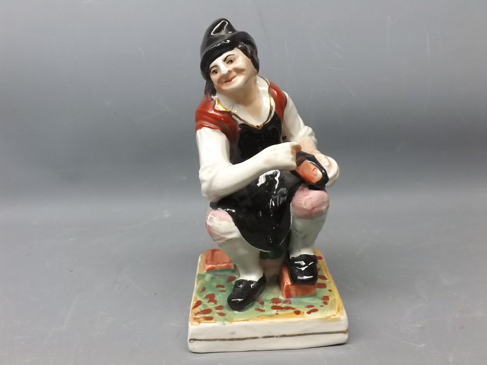 19th century Staffordshire model of a cobbler, 7ins tall