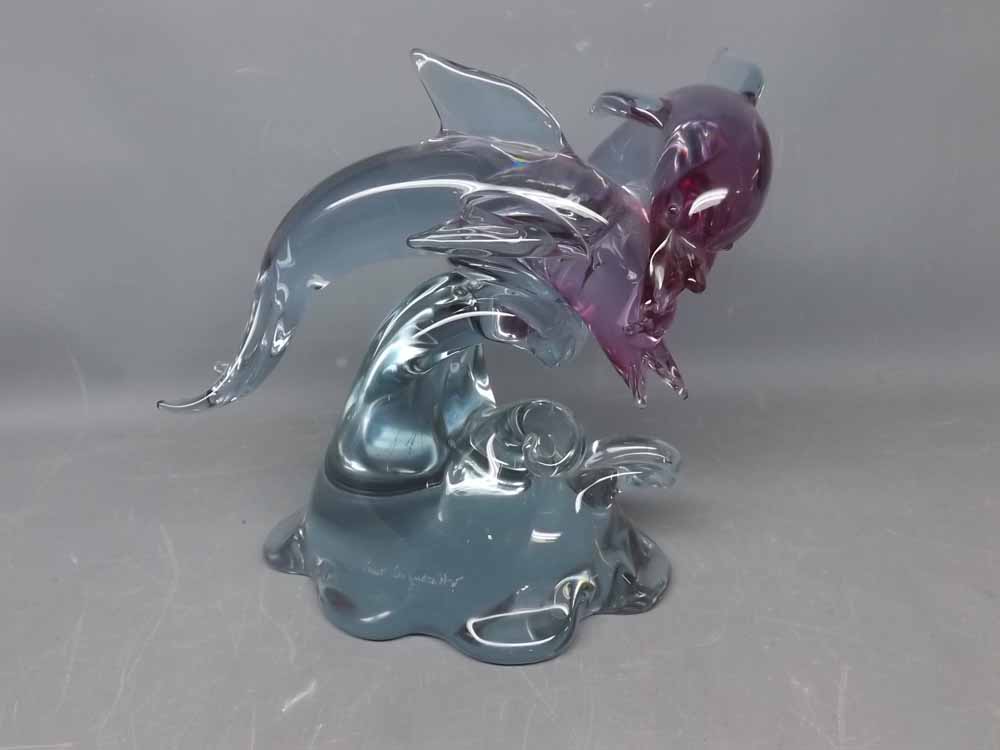 20th century coloured glass model of dolphins leaping out of the waves, signed to the foot "Pino