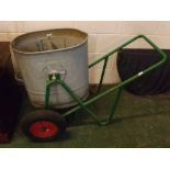 Galvanised single handled wheeled water carrier together with green painted two-wheeled trolley,