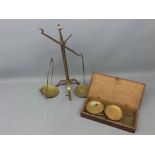 Small oak case containing scales together with a further brass set of scales (2)