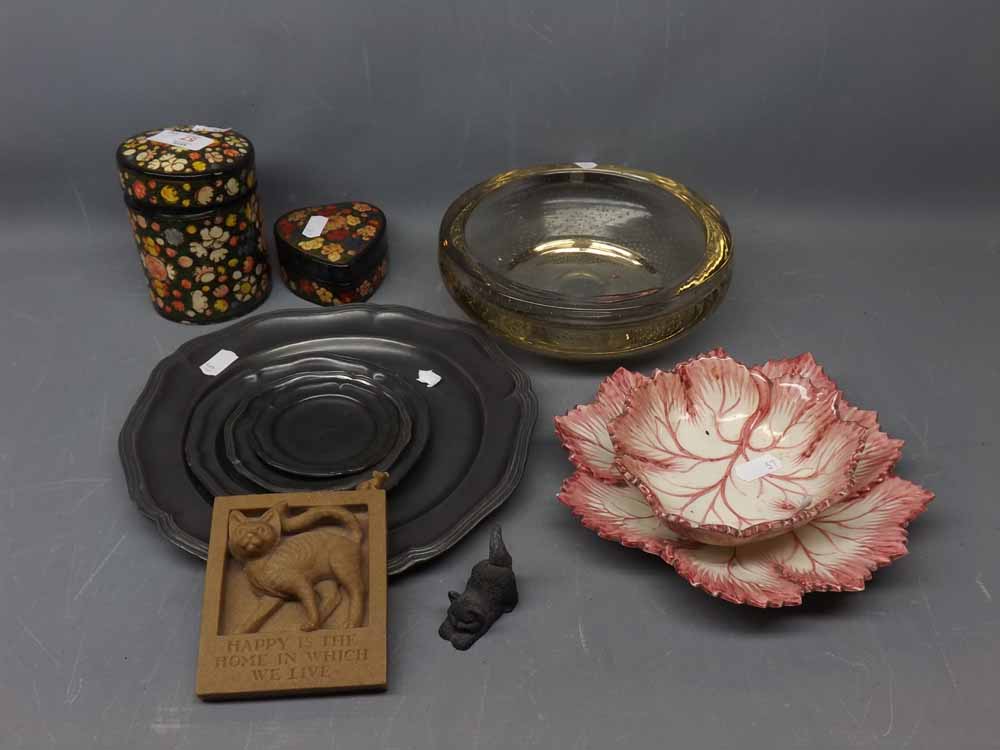 Two paper m ch floral painted storage boxes, four varying sized pewter plates and 2 cat ornaments,