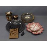 Two paper m ch floral painted storage boxes, four varying sized pewter plates and 2 cat ornaments,
