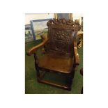 19th century oak heavily carved wainscot chair bearing plaque dated 1636, with carved gryphon