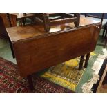 George III mahogany drop leaf gate leg table supported on five square reeded legs, 16ins x 41ins x