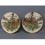 Pair of Satsuma style plates decorated with watermills, 10ins diam