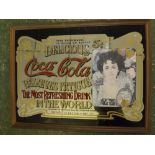 Reproduction Coca-Cola relieves fatigue pub style mirror in a beechwood frame, 25 1/2 ins wide x