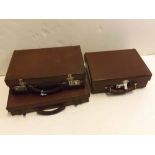 Three vintage tan leather attach cases, one with impressed Royal Georgian cipher (3)