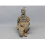 Pottery model of a kneeling Japanese soldier, 8ins tall