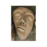 Composition garden ornament formed as a mask, 15ins high