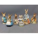 Four Beatrix Potter figures to include Hunka Munka sleeping, Tabitha Twitchet, Mrs Rabbit and