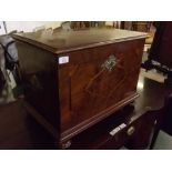 Good quality walnut inlaid small chest with decorative brass cast escutcheon raised on bun feet,