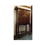 Early 20th century Oriental bamboo two-door storage cupboard on stand, with pull out brushing