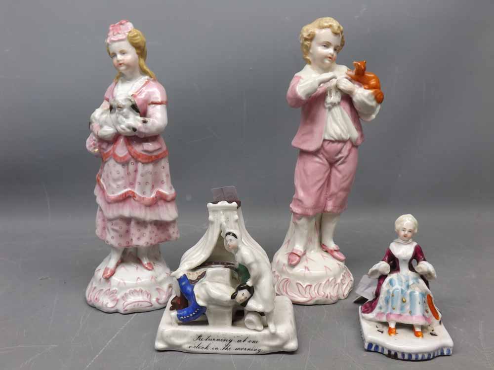 Group containing a pair of 19th century German pink and white figures together with a further