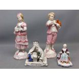 Group containing a pair of 19th century German pink and white figures together with a further