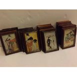 Twenty-nine beechwood framed coloured Oriental prints