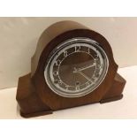 1920s walnut cased mantel clock with silvered dial and striking movement, 12ins x 9ins