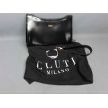 Black leather ladies clutch bag by Cluti Milano
