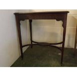 Edwardian mahogany rectangular occasional table with a decorative "X" stretcher with central oval