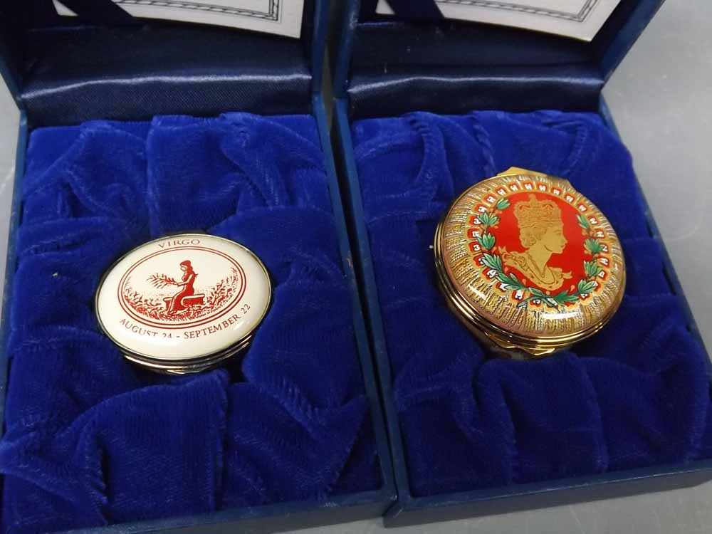 Two boxed Halcyon Days enamel pill boxes with certificates (2)