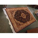 Modern Keshan carpet with mainly blue ground, central floral lozenge, 90 1/2 ins x 62ins