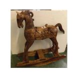 Eastern hardwood heavily carved rocking horse with detachable tail, 34ins x 37ins