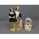 Small Staffordshire arbour group of an embracing couple, 9 1/2 cm tall, a further Staffordshire