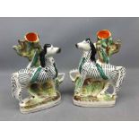 Pair of reproduction Staffordshire flat back zebras (with hairline), 7 1/2 ins tall