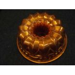 Large 19th Century Victorian copper shaped jelly mould of circular form 9ins diameter