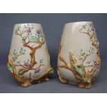 Pair of Clarice Cliff vases with raised tree and blossom design with printed marked base,