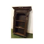 19th Century continental oak carved fronted mural style cupboard with carved figure columns with