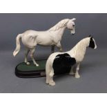 Beswick model of Desert Orchid on a plinth together with a further black and white Beswick model