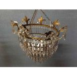 Gilt brass mounted 4 tier chandelier with prismatic drops, 15ins diameter x 15ins drop