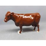 Beswick model of a Red Poll Cow in a brown gloss finish, 9ins wide x 6ins